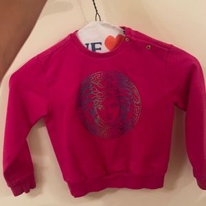 Girl fushia pink Versace sweater... like new worn once